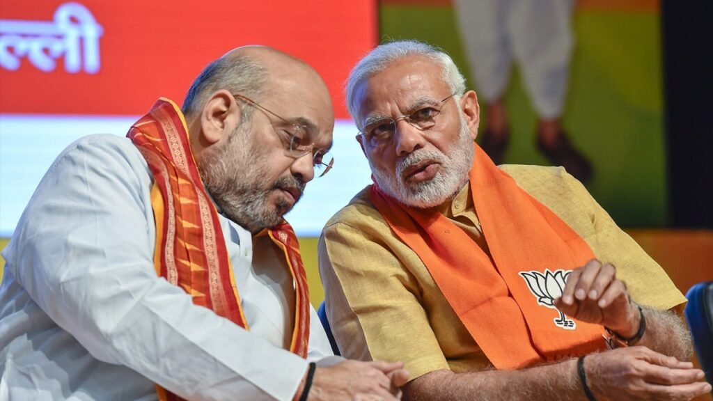 Narendra Modi,
Amit Shah